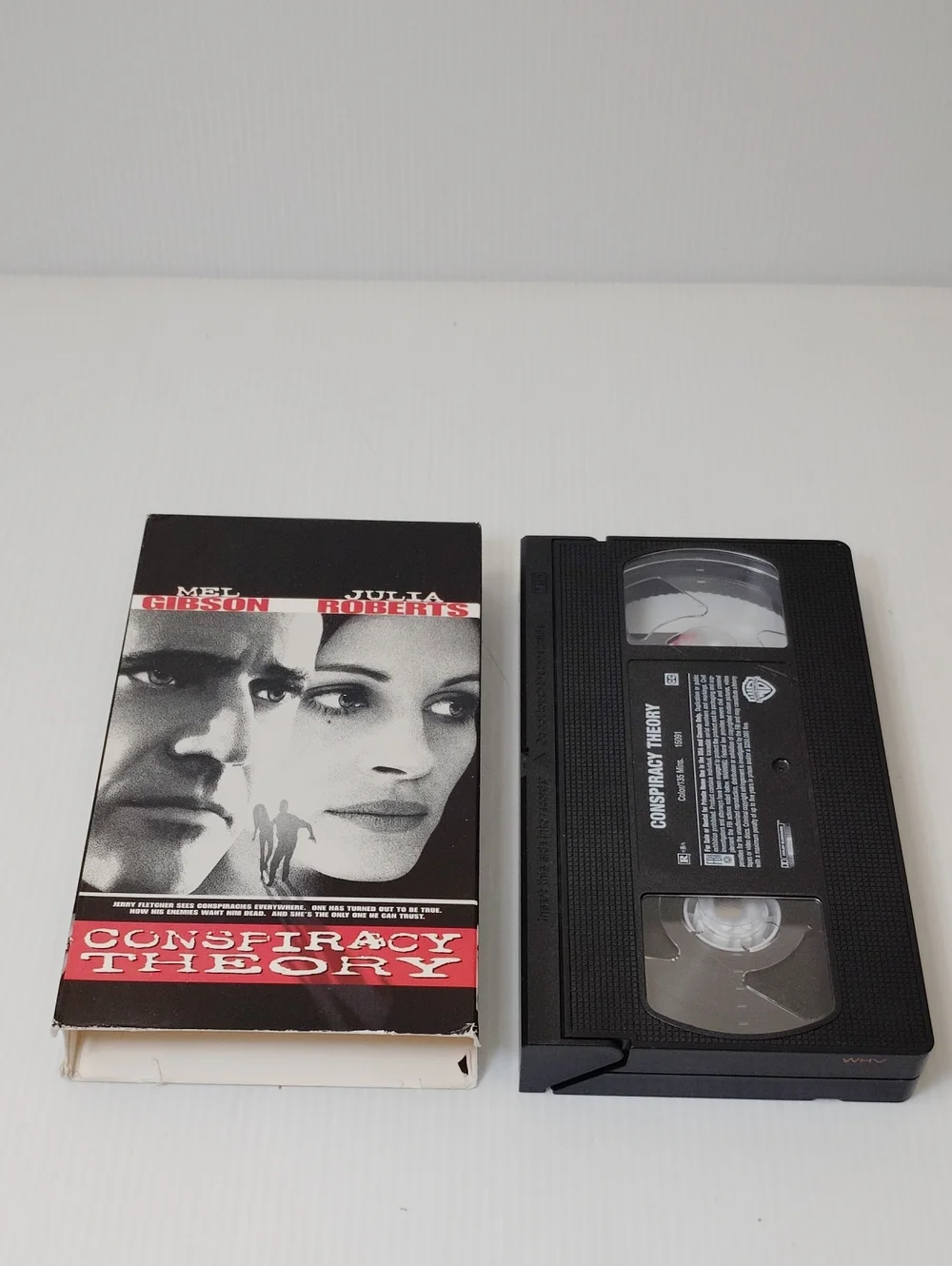 12 For $8 Conspiracy Theory VHS Tape with Sleeve - Black and White